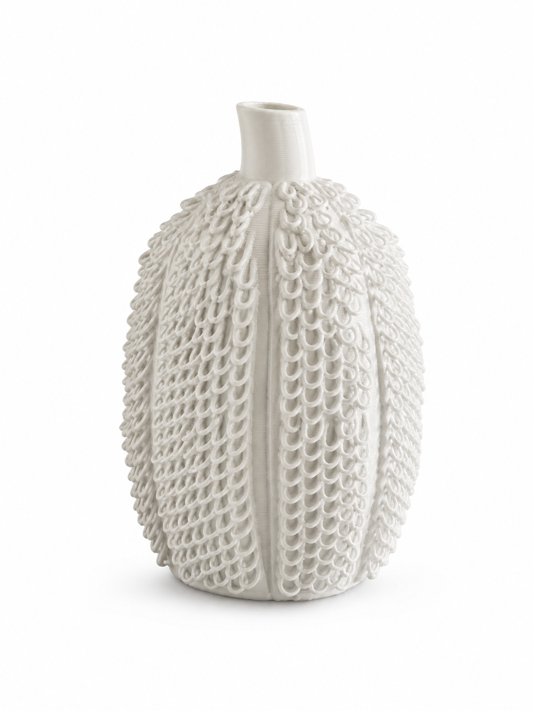 Scaled Pod Vase, a rounded warm ivory ceramic clay-printed vase with dense scale-like loop texture on a white background.