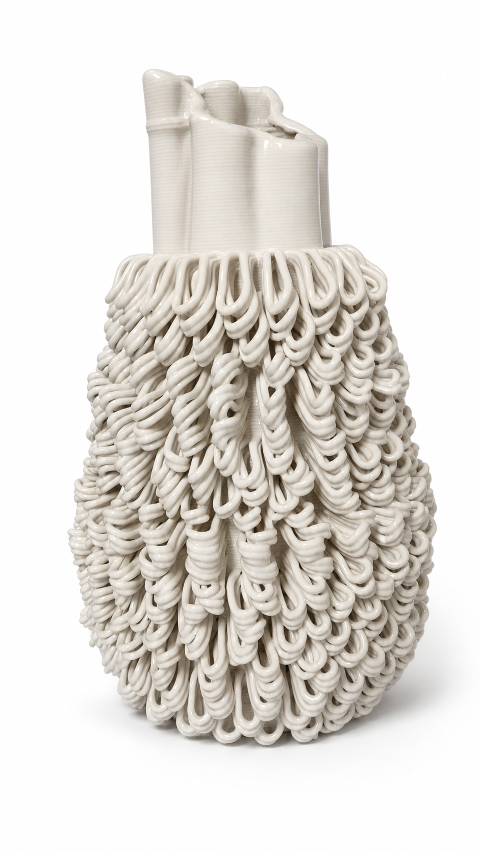 Tassel Pod Vase, a warm ivory ceramic clay-printed pod vase with cascading loop tassels on a white background.
