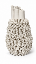 Tassel Pod Vase, a warm ivory ceramic clay-printed pod vase with cascading loop tassels on a white background.