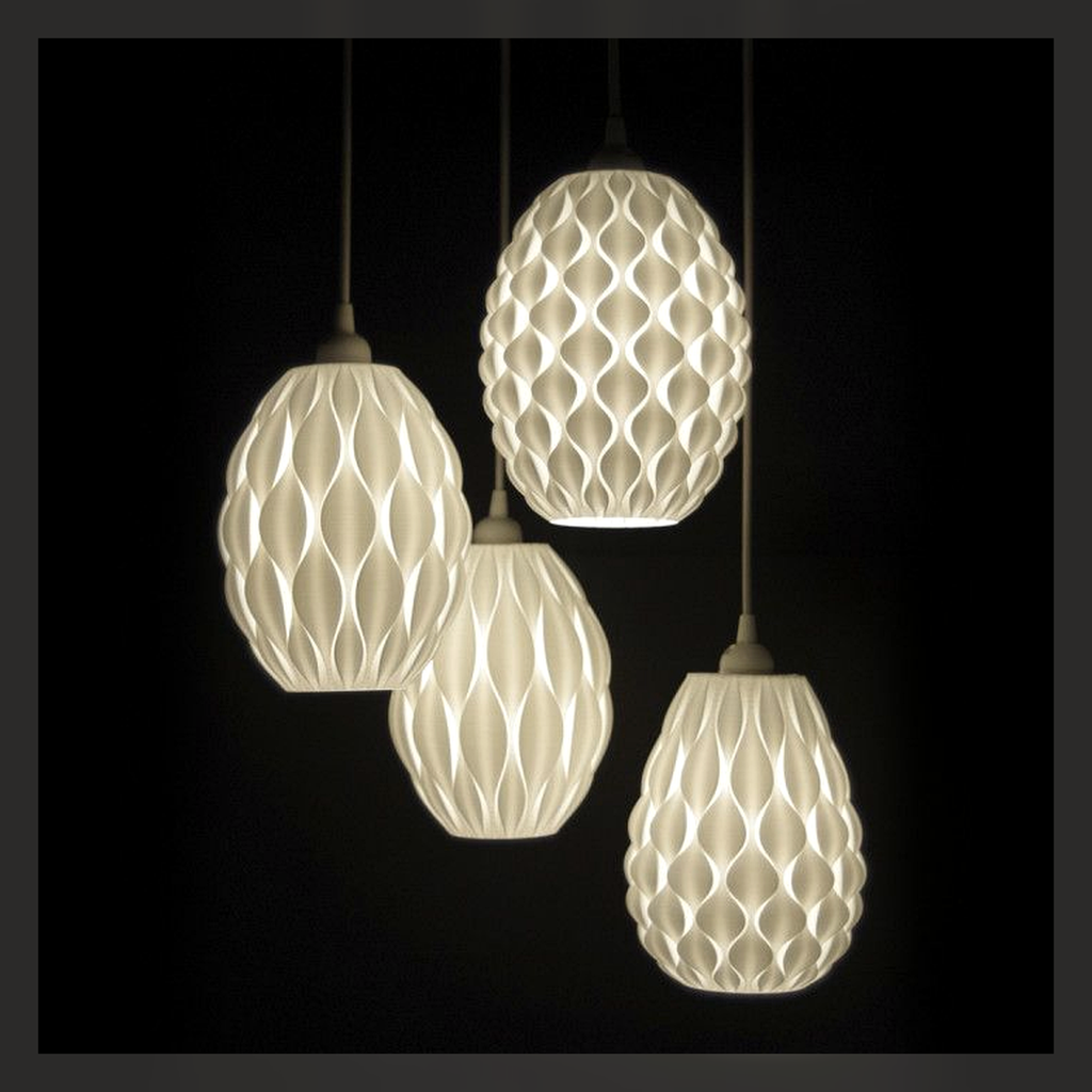 Cluster of glowing ceramic pendant lamps on a dark background.